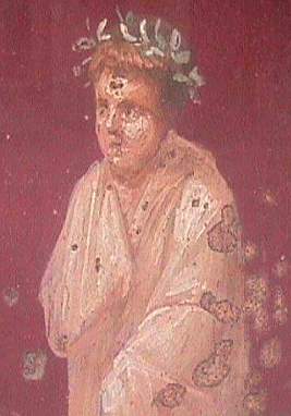 This is a fine example of a Pompeian artwork. This fresco comes from the Vettius House where there are several beautifully preserved frescoes