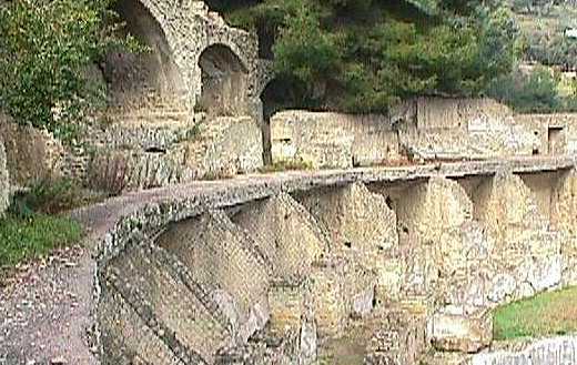 This picture shows the remains of what I believe to have been a theater. It is located on the third terrace in the "Sosandra" area of the archaeological park. There is still much debate going on concerning the usage of this area. Some feel that it was used as a theater, while others maintain that it was clearly used as a brothel. You will have to make a trip to Baia in order to see for yourself.